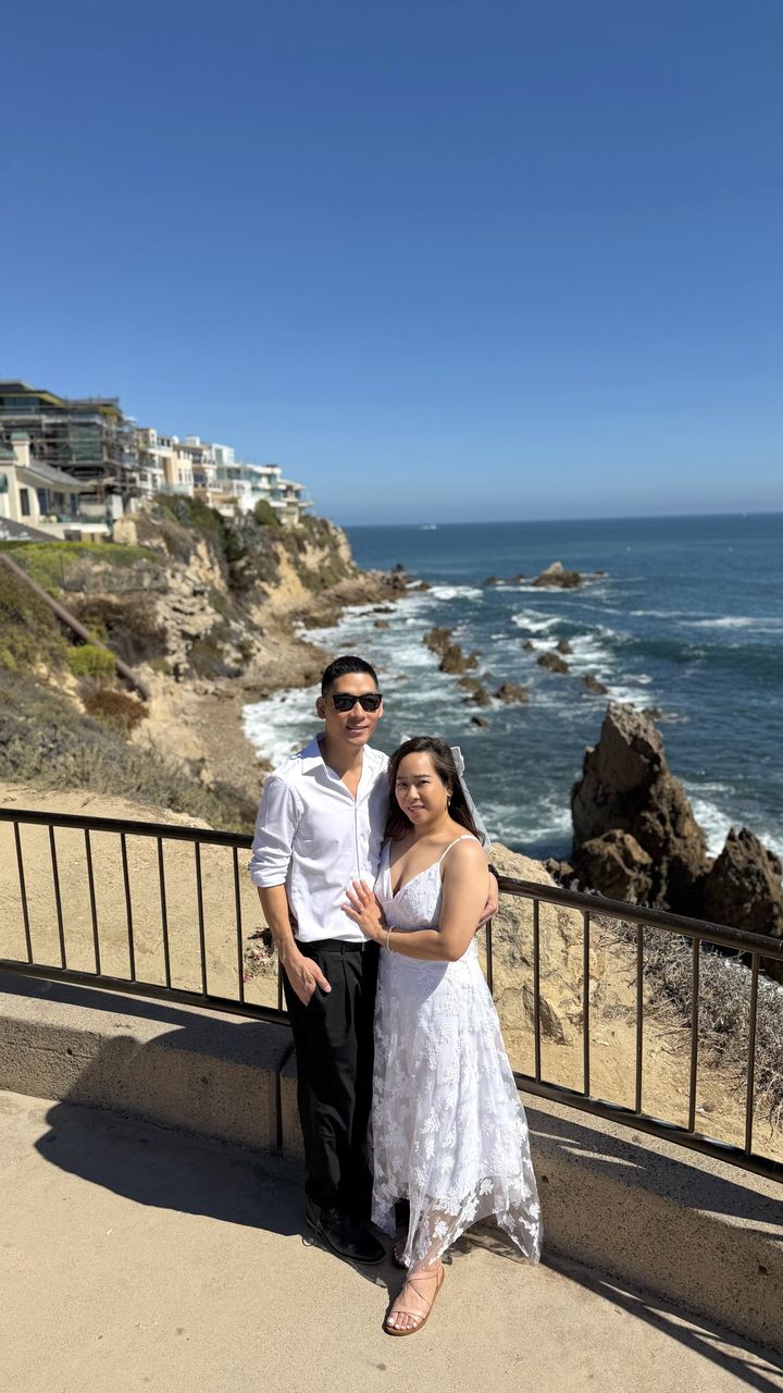 Rhona and Francis walking along the shore